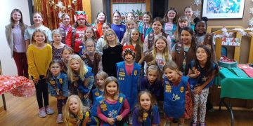 ROCORI Area Girl Scouts Do Some Caroling at Benedictine Living Community of Cold Spring