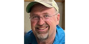 John Ervin Beckius, 60